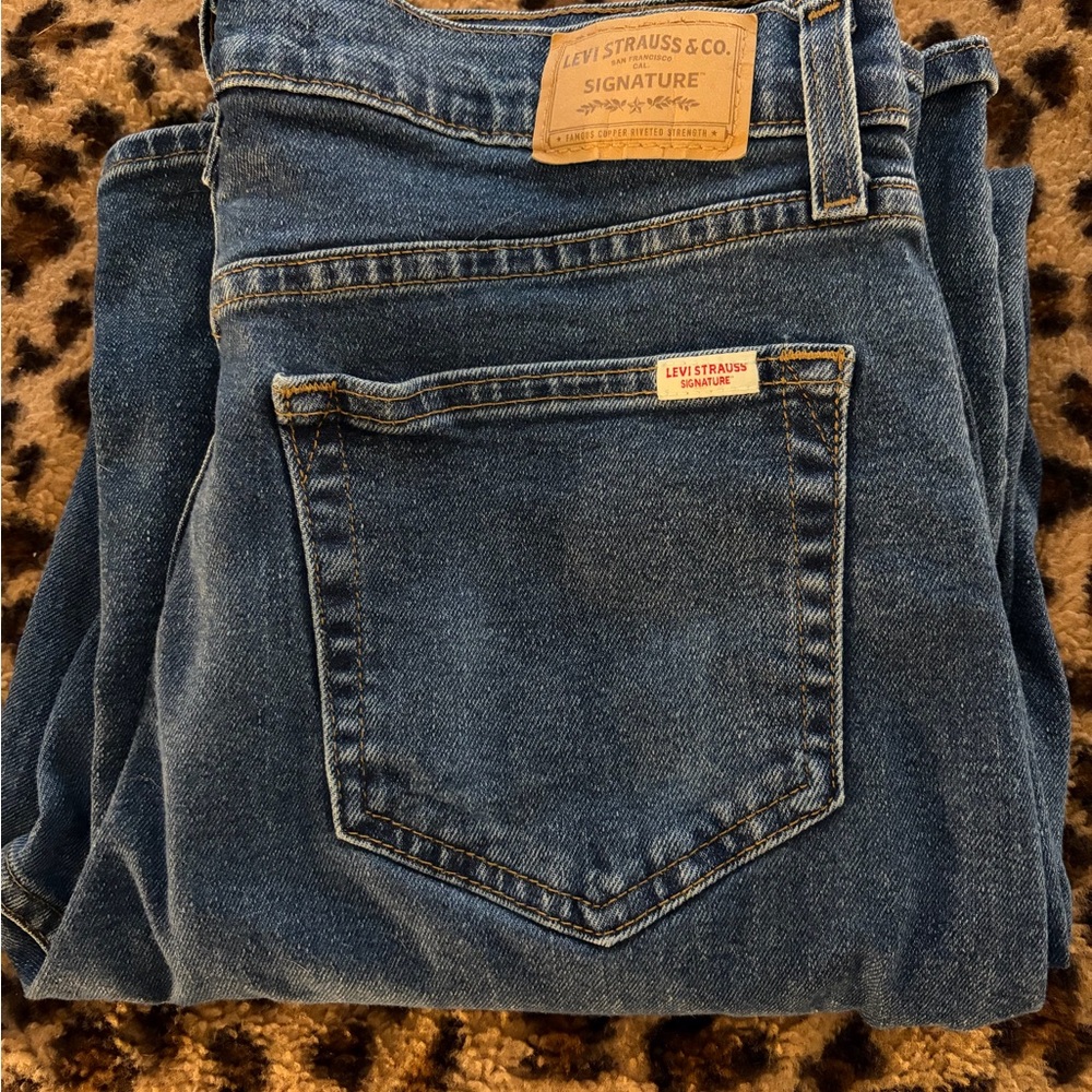 Levi's Signature Dark Blue Denim Jeans with Contrast Stitching